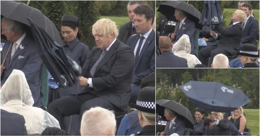 Boris Johnson “vira piada” ao tentar ser cavalheiro com um guarda-chuva (VÍDEO)